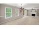 Light-filled living space offers fireplace and backyard views from two large windows at 313 Glen Echo Ln # J, Cary, NC 27518