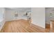 Bright and airy living room with hardwood floors and an open layout into the kitchen at 314 Wrenn St, Apex, NC 27502