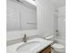 Bright bathroom with a modern vanity, large mirror, and combined tub and shower at 3141 Rapid Falls Rd, Cary, NC 27519