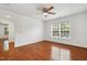 Bedroom with hardwood floors and a ceiling fan at 3141 Rapid Falls Rd, Cary, NC 27519