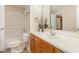 Bathroom with a shower and a vanity with lots of counter space at 408 N Stewart St, Clayton, NC 27520