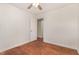 A bright bedroom with wooden floors and a ceiling fan at 408 N Stewart St, Clayton, NC 27520