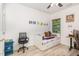 Bright bedroom with daybed, ceiling fan and a chair at a desk near a window at 425 Liberty Hill, Morrisville, NC 27560