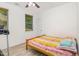 Cozy bedroom with natural light, wood floors and a comfortable bed at 425 Liberty Hill, Morrisville, NC 27560