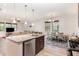 Bright, open kitchen featuring granite countertops and stainless steel appliances at 425 Liberty Hill, Morrisville, NC 27560