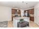 Modern kitchen with stainless steel appliances, granite counters, and a kitchen island at 425 Liberty Hill, Morrisville, NC 27560