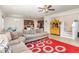 Bright, open living space featuring hardwood floors, a ceiling fan, and stairs at 425 Liberty Hill, Morrisville, NC 27560