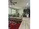 Bright living room featuring a large sectional sofa with an open concept kitchen at 425 Liberty Hill, Morrisville, NC 27560