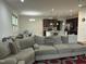 The spacious living room has an open floor plan with a kitchen and dining area at 425 Liberty Hill, Morrisville, NC 27560