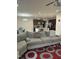 The spacious living room features an open floor plan with a kitchen and dining area at 425 Liberty Hill, Morrisville, NC 27560