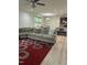 Spacious living room featuring a large sectional sofa and an open floor plan at 425 Liberty Hill, Morrisville, NC 27560