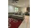 Spacious living room featuring a large sectional sofa and an open floor plan at 425 Liberty Hill, Morrisville, NC 27560
