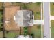 Bird's eye view of the home showcasing the spacious yard, complemented by mature trees and landscaping at 453 Granite Saddle Dr, Rolesville, NC 27571