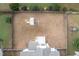 Aerial view of expansive backyard with playset and lush green space, offering endless outdoor possibilities at 453 Granite Saddle Dr, Rolesville, NC 27571