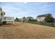 Spacious backyard area with a playset providing space for outdoor enjoyment at 453 Granite Saddle Dr, Rolesville, NC 27571
