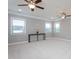 A spacious bedroom offers two ceiling fans and lots of natural light at 453 Granite Saddle Dr, Rolesville, NC 27571