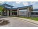 Granite Falls Swim and Athletic Club with stone and siding exterior, blue trim, and manicured landscaping at 453 Granite Saddle Dr, Rolesville, NC 27571