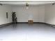 Clean, finished garage with epoxy flooring and updated water heater providing a functional space at 453 Granite Saddle Dr, Rolesville, NC 27571