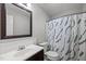 Bathroom with a modern vanity and stylish shower curtain at 4631 Timbermill Ct # 203, Raleigh, NC 27612