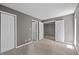Spacious bedroom featuring closet and entryways at 4631 Timbermill Ct # 203, Raleigh, NC 27612