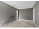 Neutral bedroom with natural light and a closet at 4631 Timbermill Ct # 203, Raleigh, NC 27612