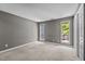 Large bedroom with two windows and closet at 4631 Timbermill Ct # 203, Raleigh, NC 27612