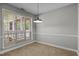 Small dining area with a window and views of the community at 4631 Timbermill Ct # 203, Raleigh, NC 27612