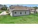 View of a home's backyard with metal fence at 475 Long View Dr, Franklinton, NC 27525