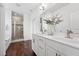 Primary bathroom with double sink vanity, glass enclosed shower, and modern fixtures at 475 Long View Dr, Franklinton, NC 27525