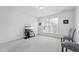 Bright bedroom featuring neutral carpet, furniture, window and decor at 475 Long View Dr, Franklinton, NC 27525