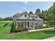 Beautiful home with manicured lawn, attractive landscaping, and a welcoming covered porch at 475 Long View Dr, Franklinton, NC 27525