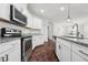 Well-equipped kitchen featuring stainless steel appliances, granite countertops, and ample cabinetry at 475 Long View Dr, Franklinton, NC 27525