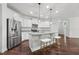 Stylish kitchen equipped with stainless steel appliances, granite counters, and an island with seating at 475 Long View Dr, Franklinton, NC 27525