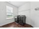 Bright laundry room featuring new washer and dryer machines and wire rack shelving at 475 Long View Dr, Franklinton, NC 27525