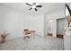 Stylish office with neutral colors, a modern ceiling fan, a closet and ample natural light at 475 Long View Dr, Franklinton, NC 27525