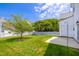 Well-maintained backyard featuring a fire pit at 5016 Dawn Piper Dr, Raleigh, NC 27613