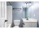 Bathroom featuring a vanity, toilet, mirror, and shower at 5016 Dawn Piper Dr, Raleigh, NC 27613