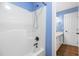 Bathroom showcasing a shower with white fixtures and an adjacent vanity at 5016 Dawn Piper Dr, Raleigh, NC 27613