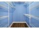 Well-organized walk-in closet with custom shelving, offering plenty of storage and organization space at 5016 Dawn Piper Dr, Raleigh, NC 27613