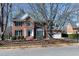 Attractive brick home with lush landscaping and a well-maintained front yard at 511 Windstream Way, Cary, NC 27518