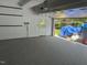 Spacious garage leading to the outdoors, featuring a sealed floor at 511 Windstream Way, Cary, NC 27518