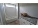 Bathroom featuring a tub with white subway tile and granite vanity at 55 Livingston Ln, Spring Hope, NC 27882