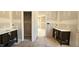 Bathroom showcasing dual vanities, providing ample space and elegant design for modern living at 55 Livingston Ln, Spring Hope, NC 27882