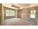 Bright and airy bedroom featuring natural light, with a tray ceiling creating an inviting atmosphere at 55 Livingston Ln, Spring Hope, NC 27882