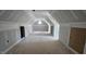 An expansive, unfinished bonus room offers limitless possibilities for customization and entertainment space at 55 Livingston Ln, Spring Hope, NC 27882