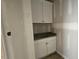 Mudroom area featuring cabinets with granite counter and sink, with a clean and functional design at 55 Livingston Ln, Spring Hope, NC 27882