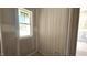 The new powder room has tongue and groove with a window to brighten the space; plumbing is stubbed out at 55 Livingston Ln, Spring Hope, NC 27882