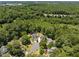 Aerial shot of neighborhood with tree-lined streets and well-maintained homes at 5601 Preston Pl, Raleigh, NC 27604
