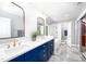 Stylish bathroom featuring double sinks, granite countertops, and a glass-enclosed shower and soaker tub at 574 Chatham Dr, Chapel Hill, NC 27516