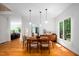 Open dining room with hardwood floors and natural light at 574 Chatham Dr, Chapel Hill, NC 27516